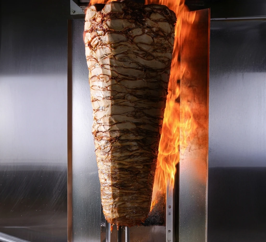 Grilled chicken skewers fresh off the grill at Al Zain, halal Middle Eastern restaurant in London, Ontario
